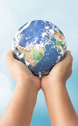 Pair of hands holding the Earth.