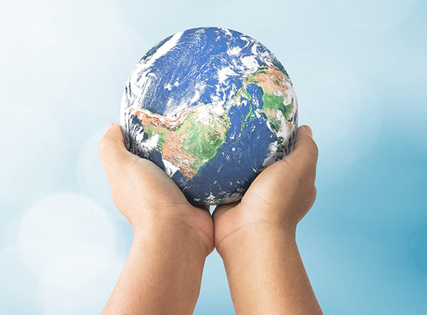 Pair of hands holding the Earth.